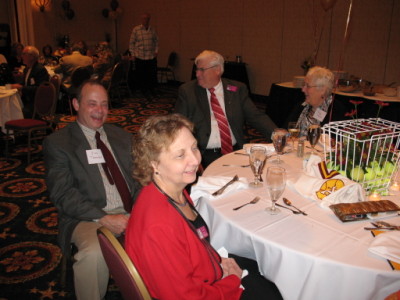 Martha Boylan Thomson, Jim Thomson, Lew and Tammy Flowers enjoy the band