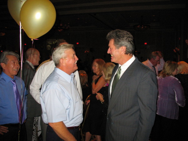 Chris Moy looks on as Danny Baker and Lonnie Soles remember good times