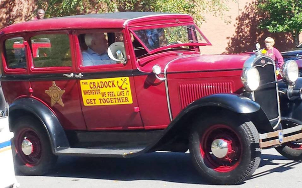 A Vintage automobile sponsored by The Portsmouth Sherriff's Department.